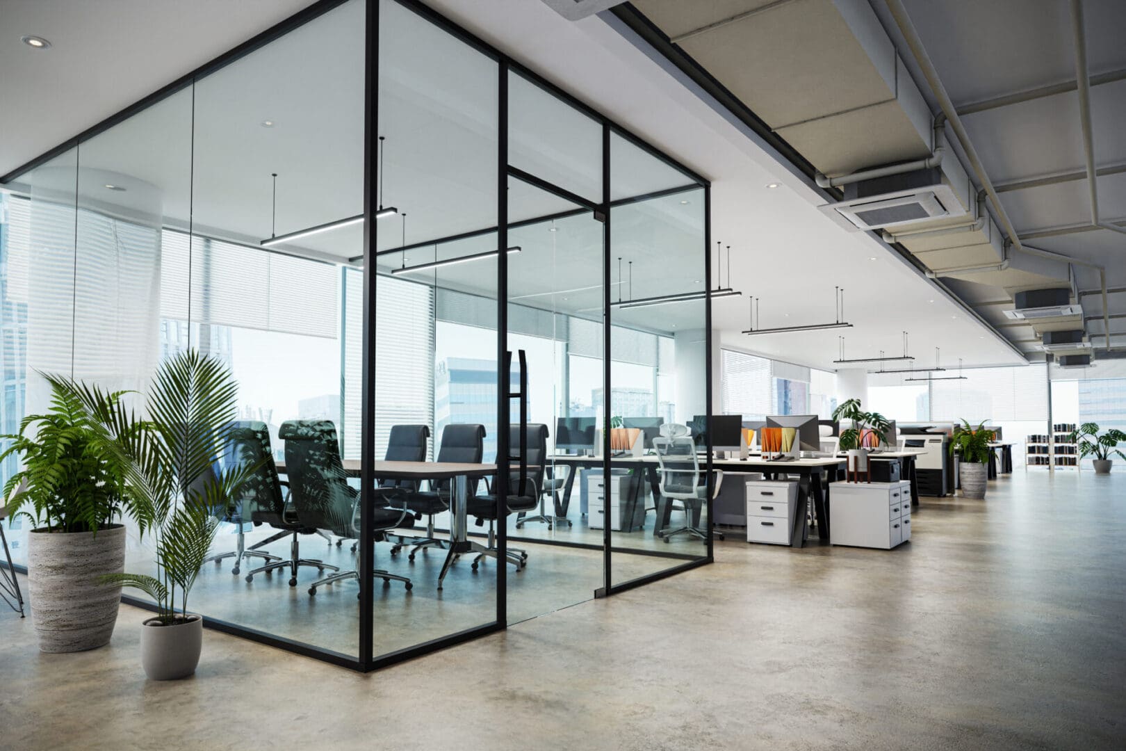 Modern open-plan office with glass meeting room.
